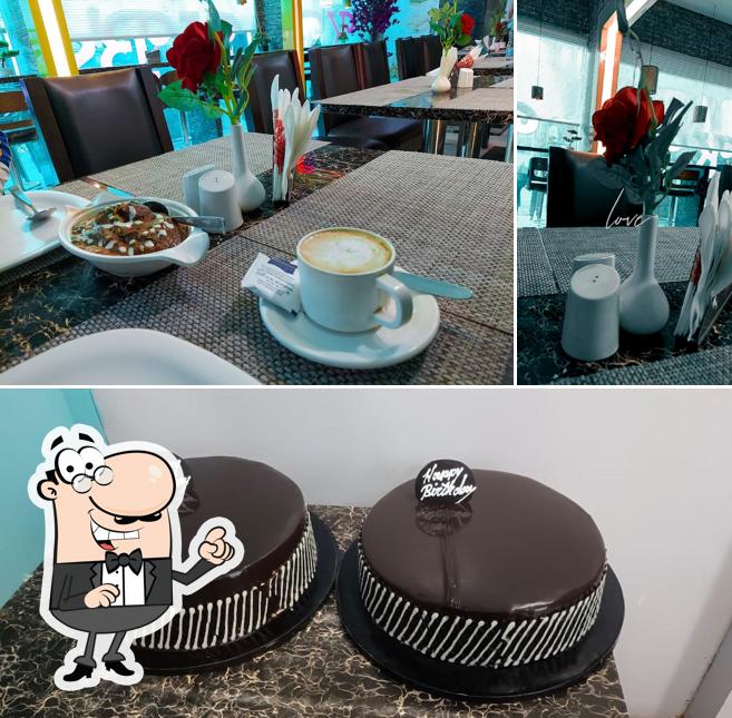Take a look at the image depicting interior and food at KB's Cake Lake
