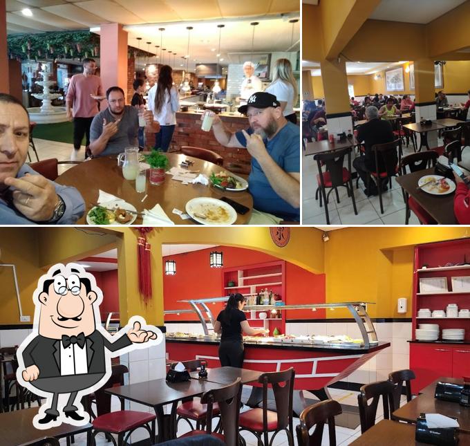 Sente em uma das mesas no Restaurante Malindi