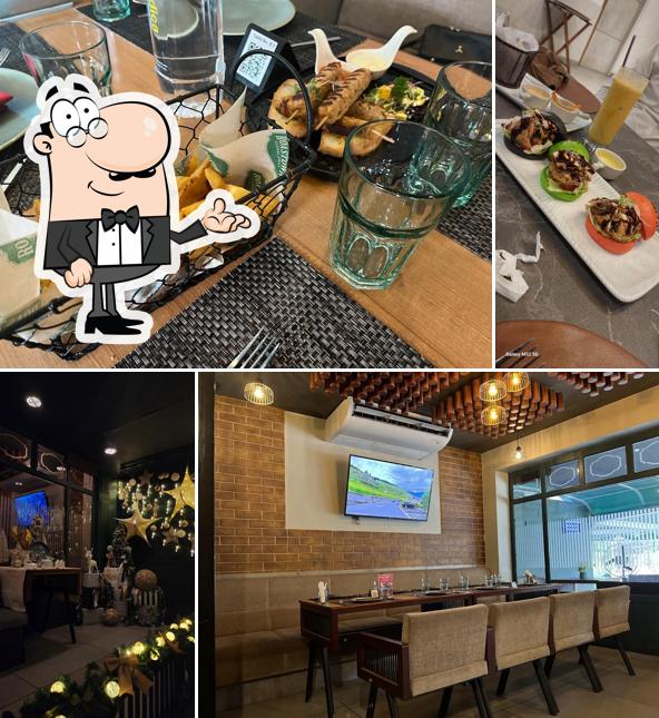 Take a seat at one of the tables at ROASTOWN-Global Cuisine Restaurant