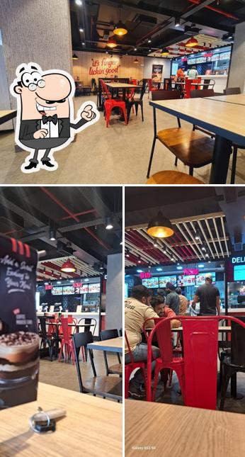 Take a seat at one of the tables at KFC