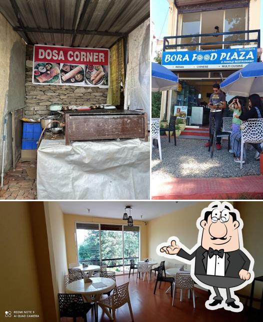 Take a seat at one of the tables at bora food plaza,multicusine restaurant