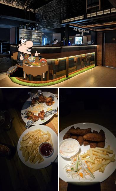 Among different things one can find food and interior at COCO Sky Pub - Rooftop Restobar