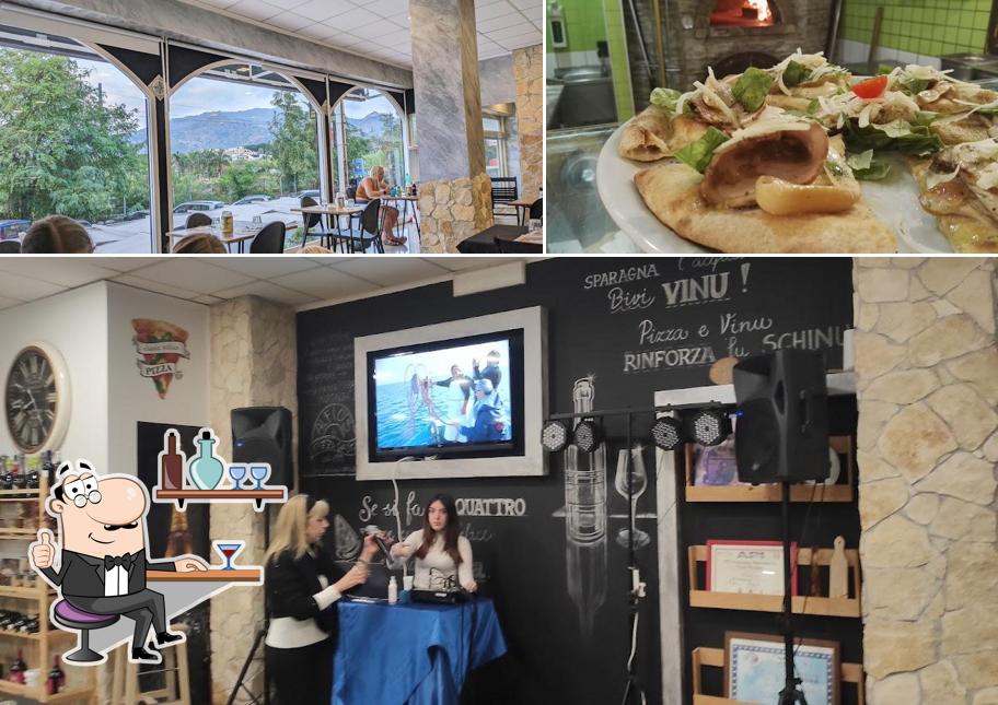 La foto della interni e cibo di Alfio's Pizza & Pasta