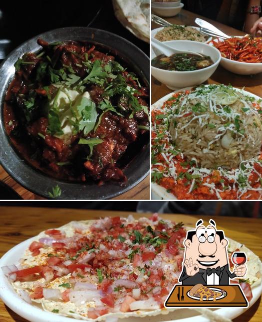 Try out pizza at Hotel Nandgaonkar's