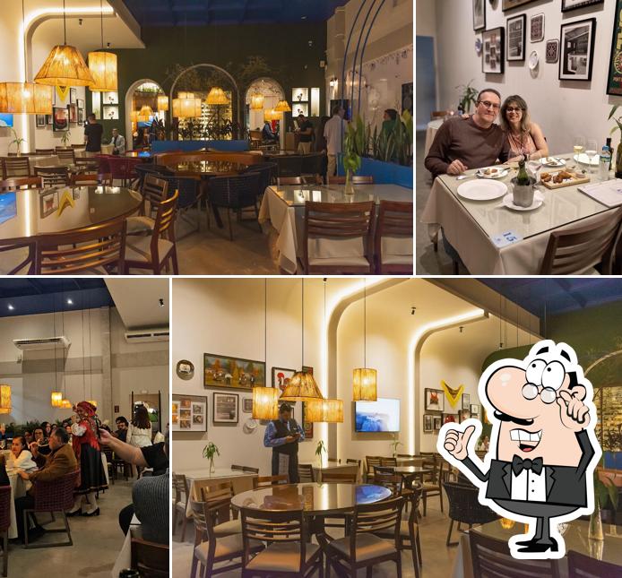 Sente em uma das mesas no Restaurante A Portuguesa - Garanhuns