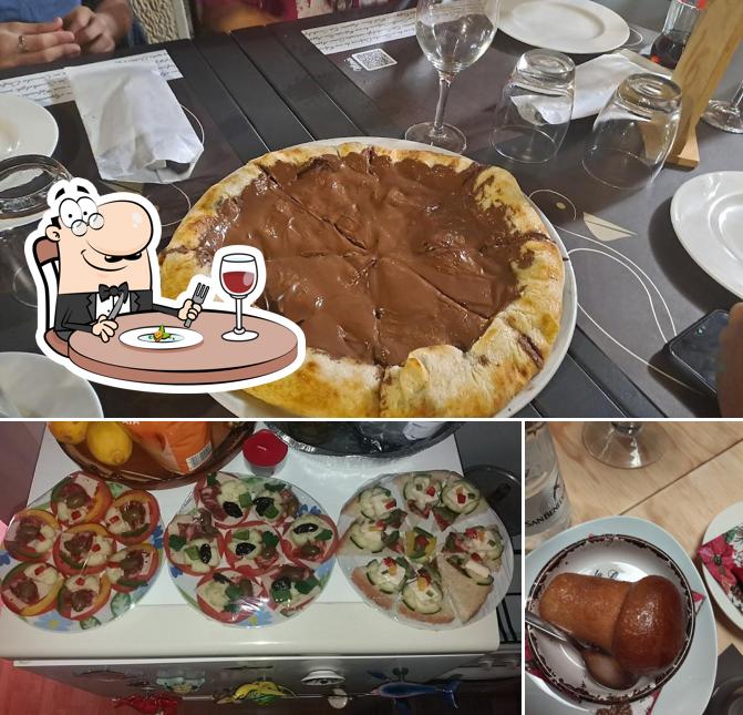 La foto di cibo e bevanda da Il Pellicano Ristorante - Pizzeria - Paninoteca