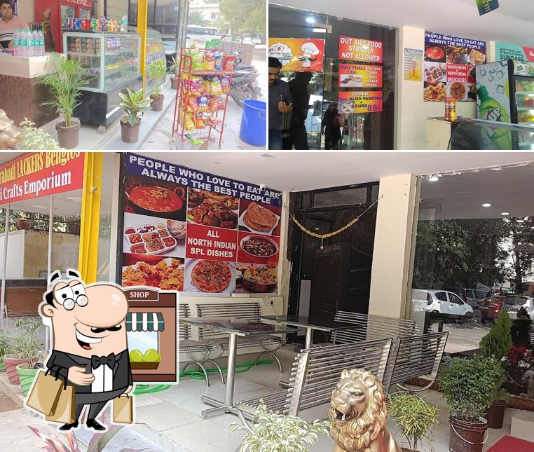 The picture of exterior and interior at Chappan Bhog Family Dhaba