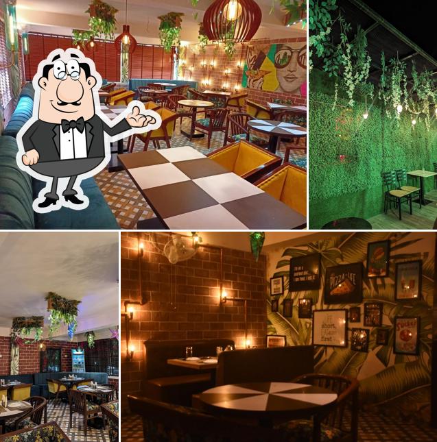 Take a seat at one of the tables at Bhaiyo Ka Dhaba 2.0 Restaurant