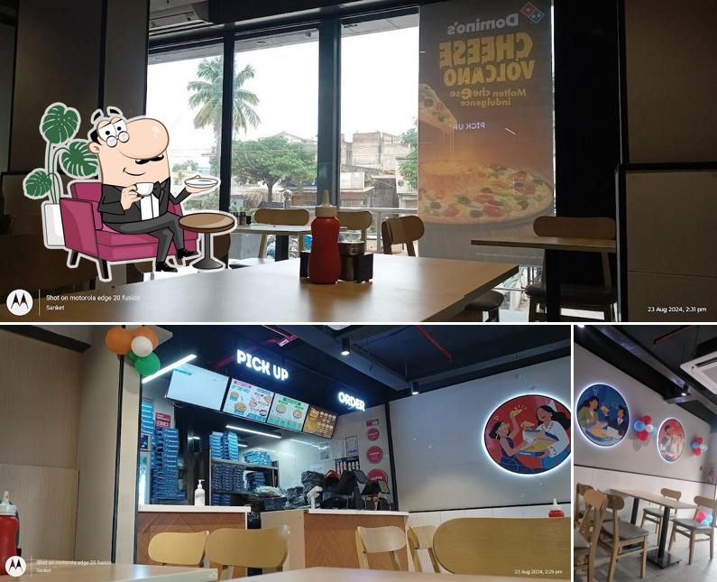 Take a seat at one of the tables at Domino's Pizza Bajrang Nagar, Jagdalpur Take a seat at one of the tables at Domino's Pizza Bajrang Nagar, Jagdalpur