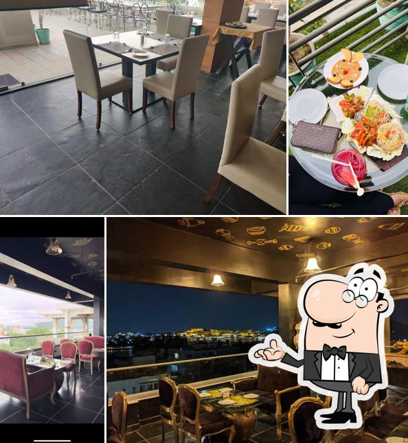 Take a seat at one of the tables at The Big Pot