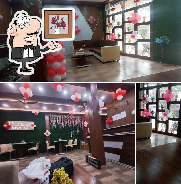 The interior of Pizza Town 31