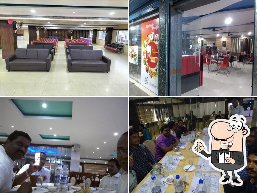 Take a seat at one of the tables at SVA Hotel Grand