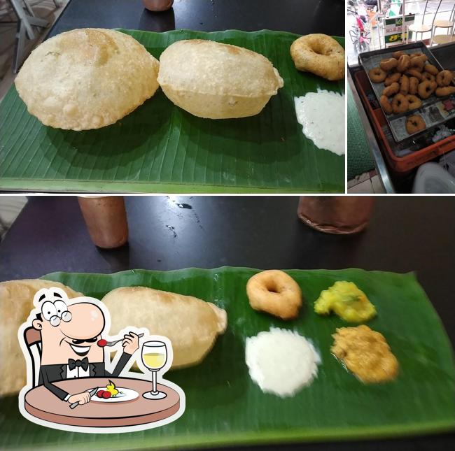 This is the image showing food and interior at Hotel Archana