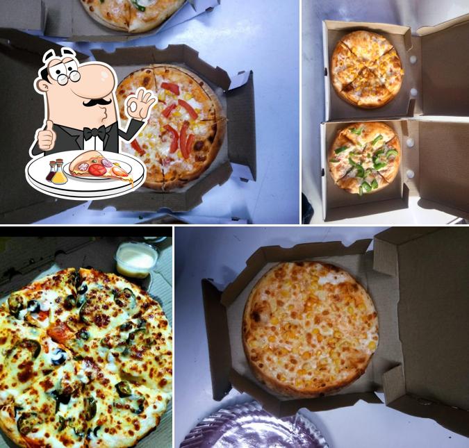 At V. i.p Pizza House Burger, you can enjoy pizza