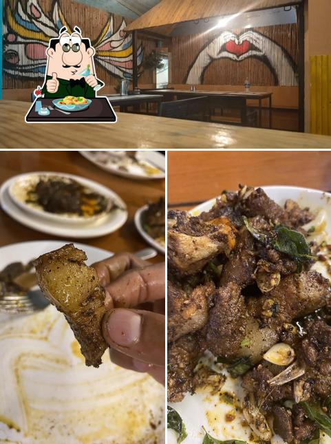 Take a look at the image displaying food and interior at COORG DELICACY