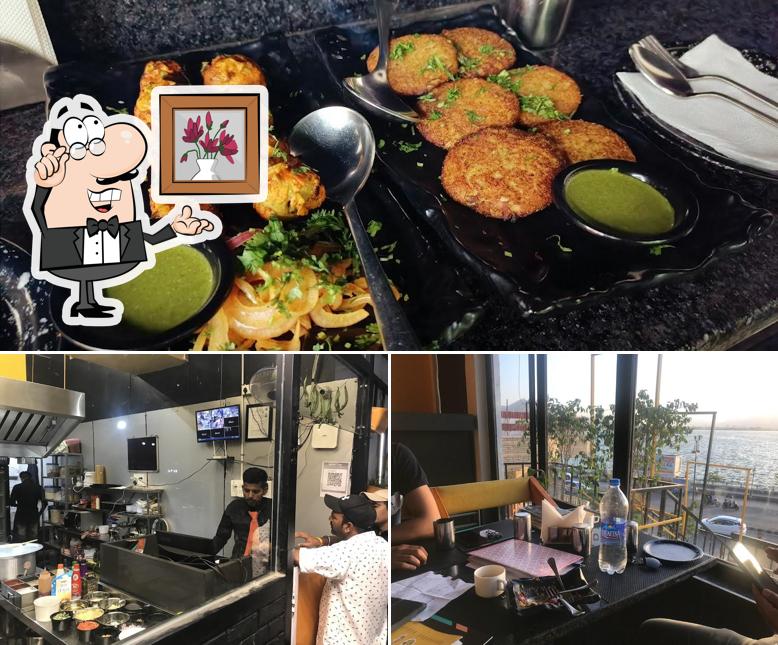 Take a seat at one of the tables at OTG-Old Town Grill Restaurant & Cafe