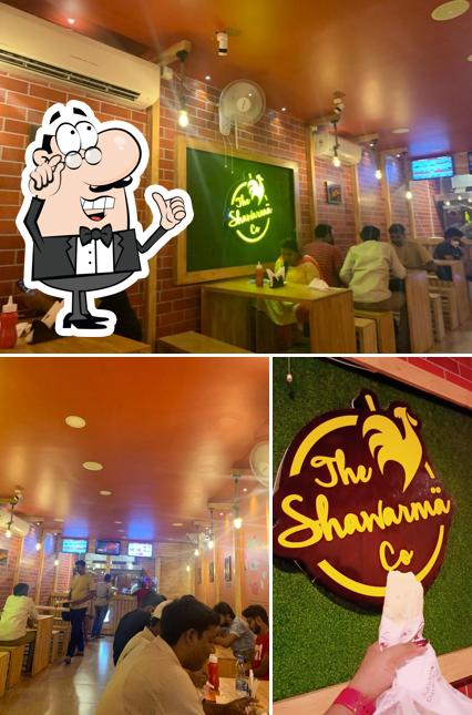The photo of interior and food at The Shawarma Company