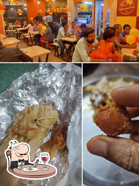 This is the photo showing food and interior at The shawarma company nellore