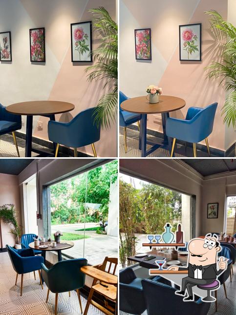 Take a seat at one of the tables at Maison Rose (Multi Cuisine Restaurant)