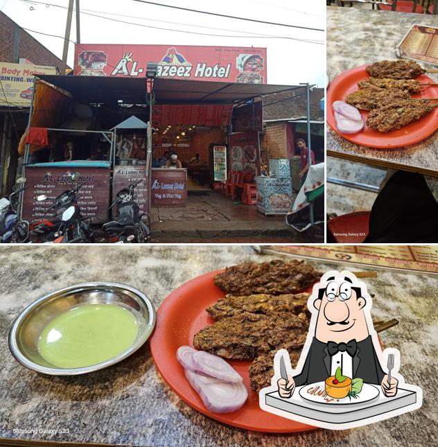 The photo of Al Lazeez Hotel’s food and exterior