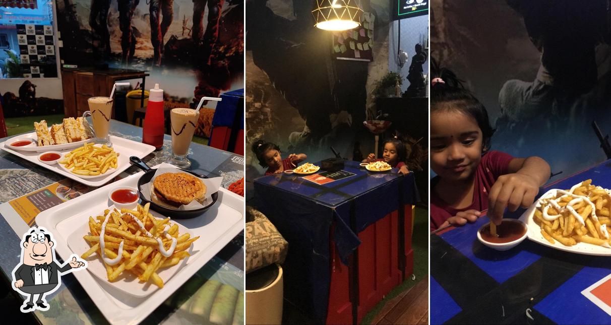Take a seat at one of the tables at Infinity Cafe Marunji