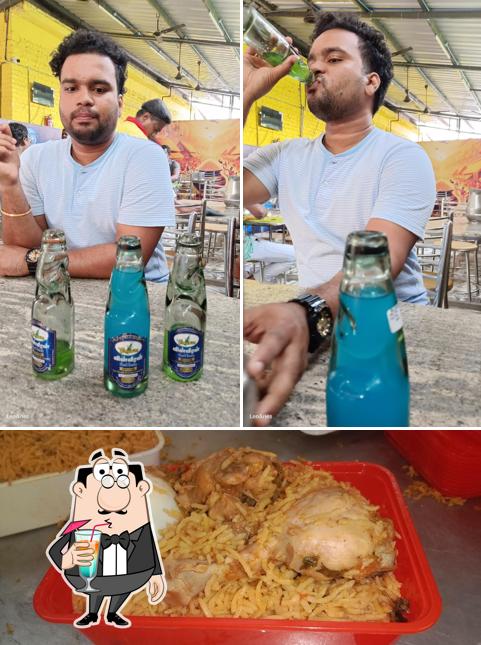 Check out the picture showing drink and food at Hari biryani
