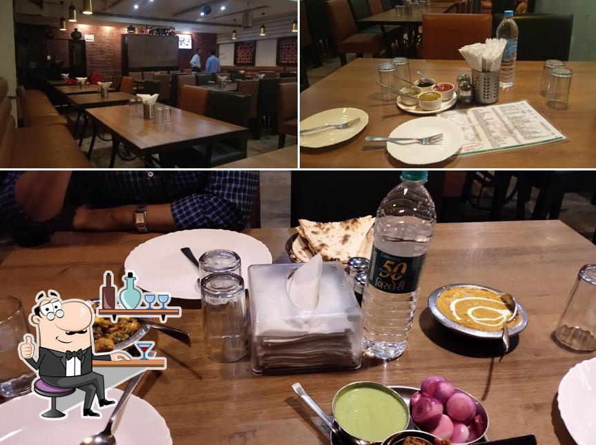 Take a seat at one of the tables at Haveli Restaurant