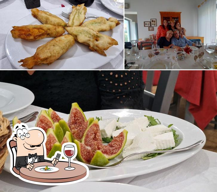 Questa è la foto che mostra la cibo e interni di Pian Castagneto
