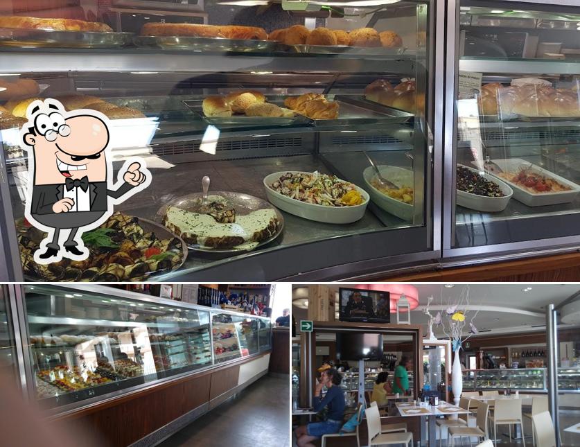 Dai un'occhiata agli interni di Oasi Bar