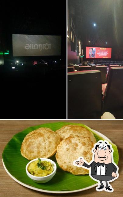 This is the image showing interior and food at Nachiyar Mess, Bhuvanagiri
