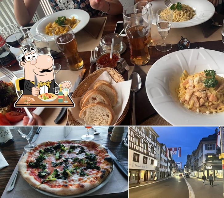 Pizzeria Restaurant Roma si caratterizza per la cibo e esterno