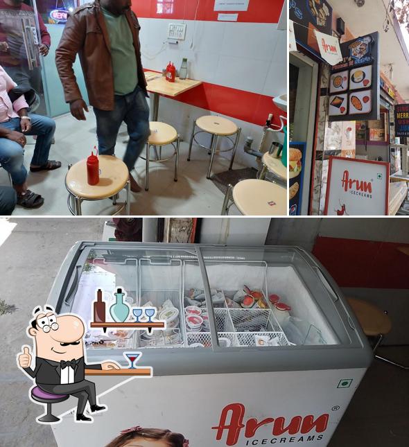 The picture of interior and food at Navi's Pizzaa N Sub's