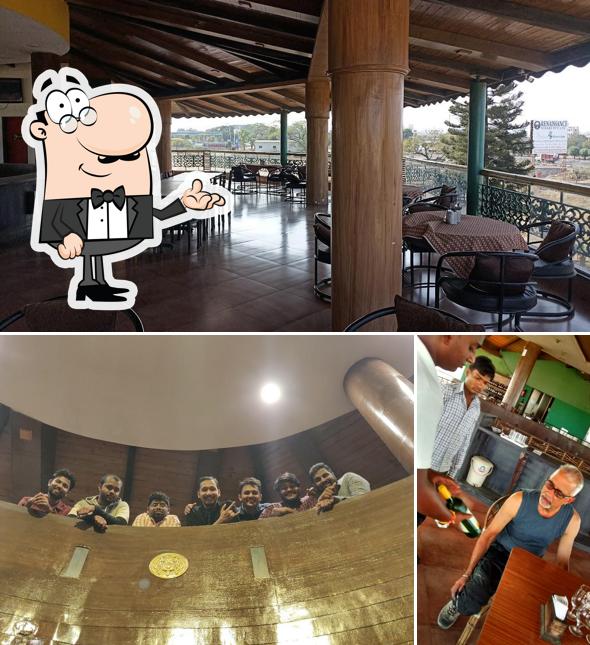 Take a seat at one of the tables at Milestone Restaurant And Wine LOUNGE (formerly Renaissance) , Ozar