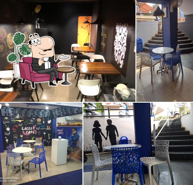 Take a seat at one of the tables at Lassi & Cafe