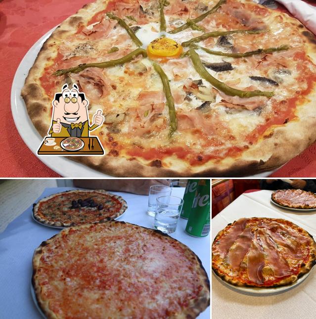 A Pizzeria Rudatis (Solo pizza da asporto-Take away pizza only-Solo pizza para llevar-Nur pizza zum mitnehmen), puoi provare una bella pizza
