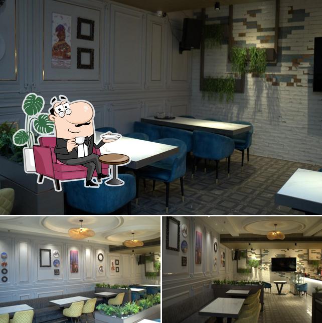 Take a seat at one of the tables at Bambai Restobar- Serving Memories