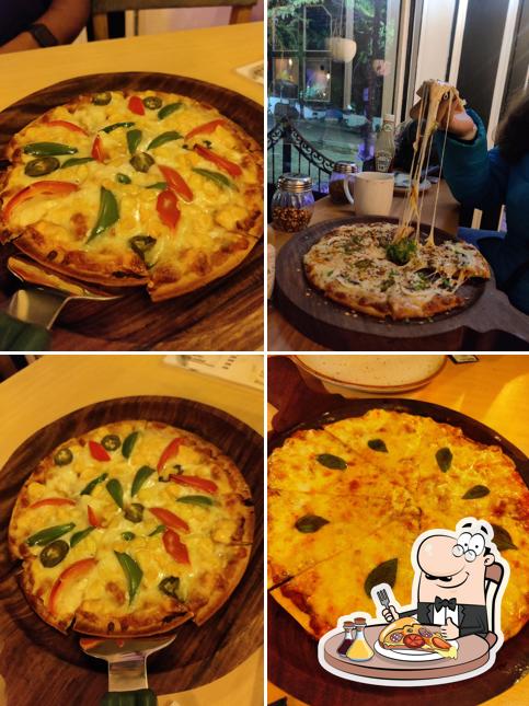 Try out pizza at Blooms café