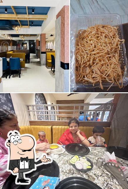 This is the picture depicting interior and food at Sri Santosh Family Dhaba - Best Restaurant In Bandlaguda Suncity