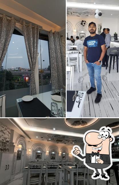 Take a seat at one of the tables at The Palacia - Café & Restaurant