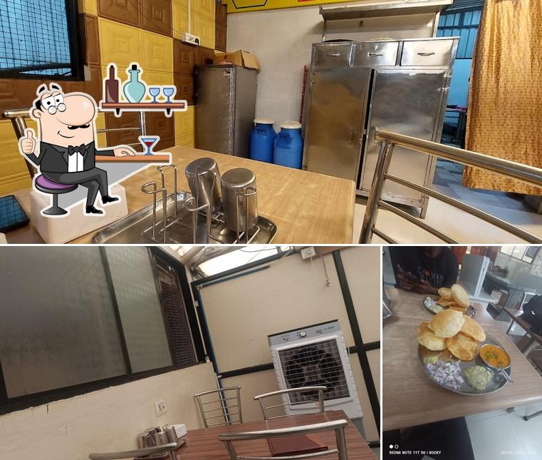The image of interior and food at Hotel Amrut Garden