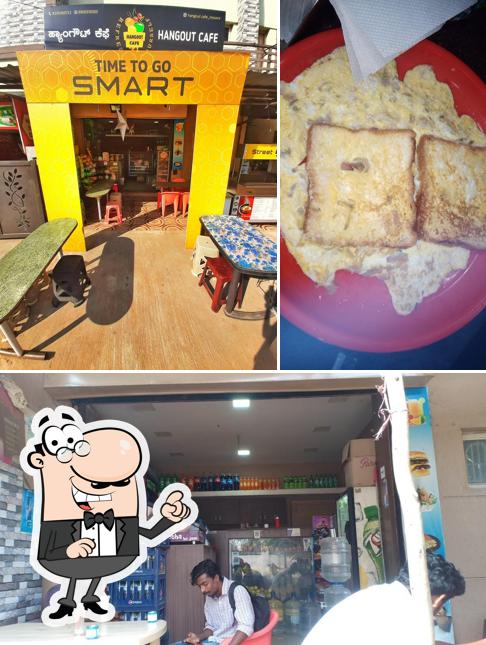 Take a seat at one of the tables at Hangout Cafe Mysore