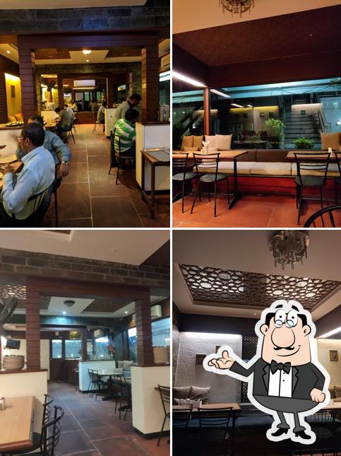 Take a seat at one of the tables at Lazeez