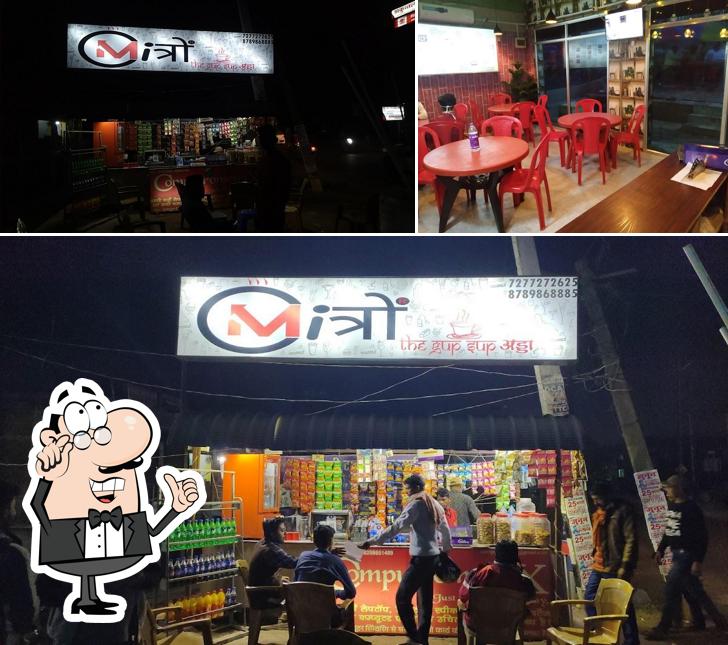 Take a seat at one of the tables at Miत्रों The gup_sup अड्डा