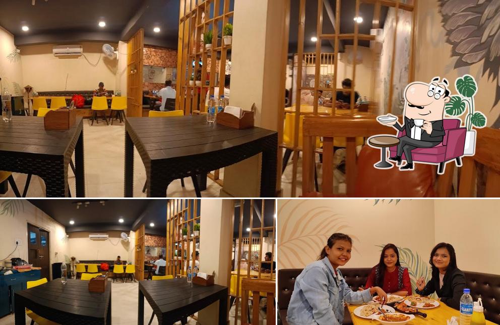 Take a seat at one of the tables at Big Bites Restaurent