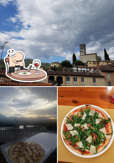 Pizzeria Che Pizza si caratterizza per la cibo e esterno