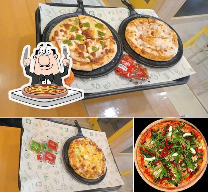 Get pizza at Quezon Restaurant & Cafe Ferozepur