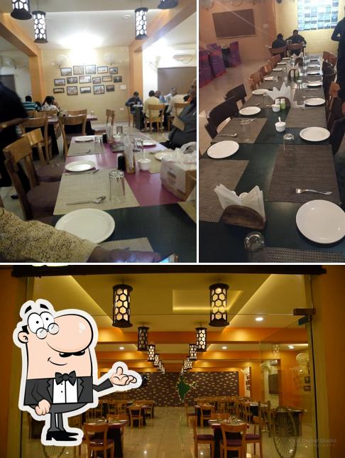 Take a seat at one of the tables at THE GOLDEN MOMENTS