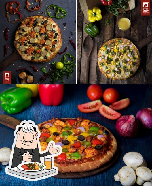 Check out the image showing food and interior at Oven Story Pizza