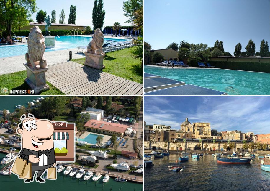 Puoi goderti l'aria fresca da seduto all'esterno di Marina Del Sole