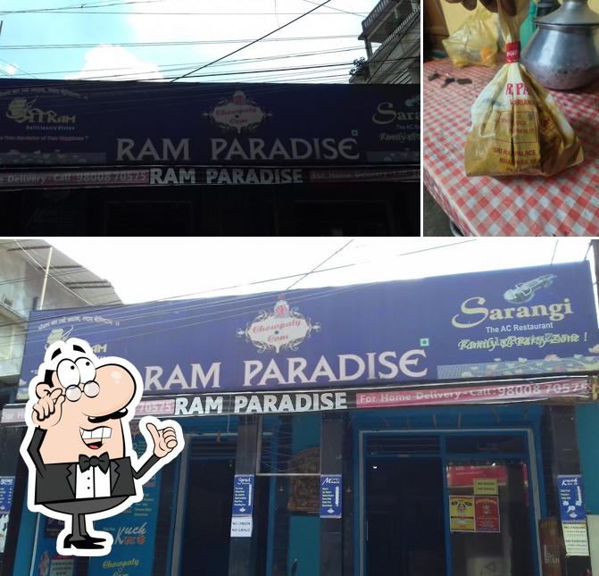 Take a seat at one of the tables at Nirvana - By Sri Ram Paradise